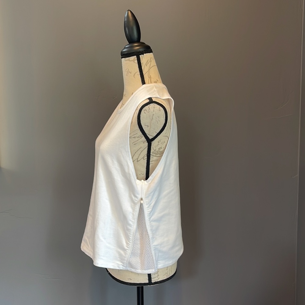ATHLETA white top with side vented zippers